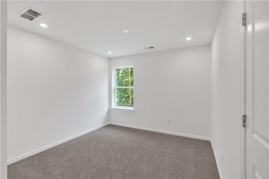Spacious, unfurnished interior of a new home in The Overlook at Factory Shoals, Mableton (Image 32).