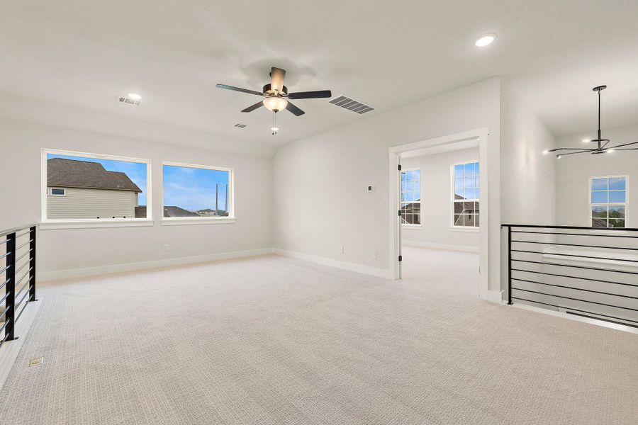 Spacious, unfurnished interior of a new home in Blackhawk in Pflugerville, Pflugerville (Image 24).