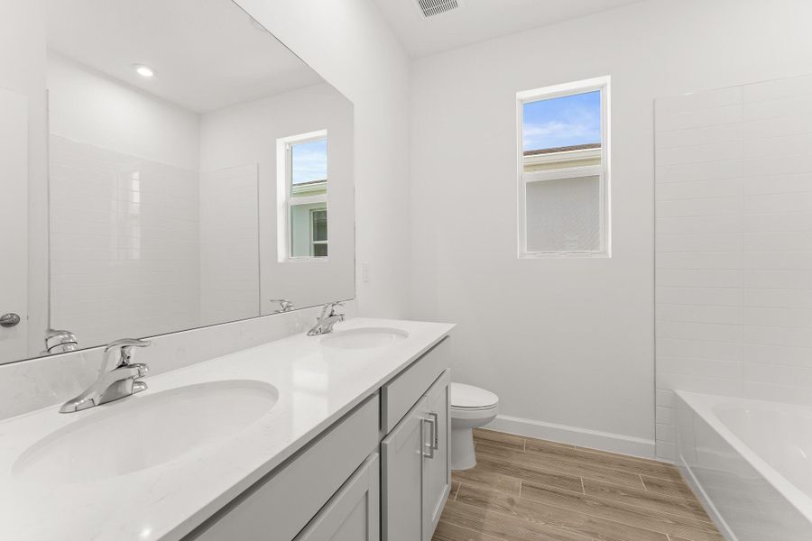 Furnished interior view inside a new home in Tradition - Cadence, Port St. Lucie (Image 5).