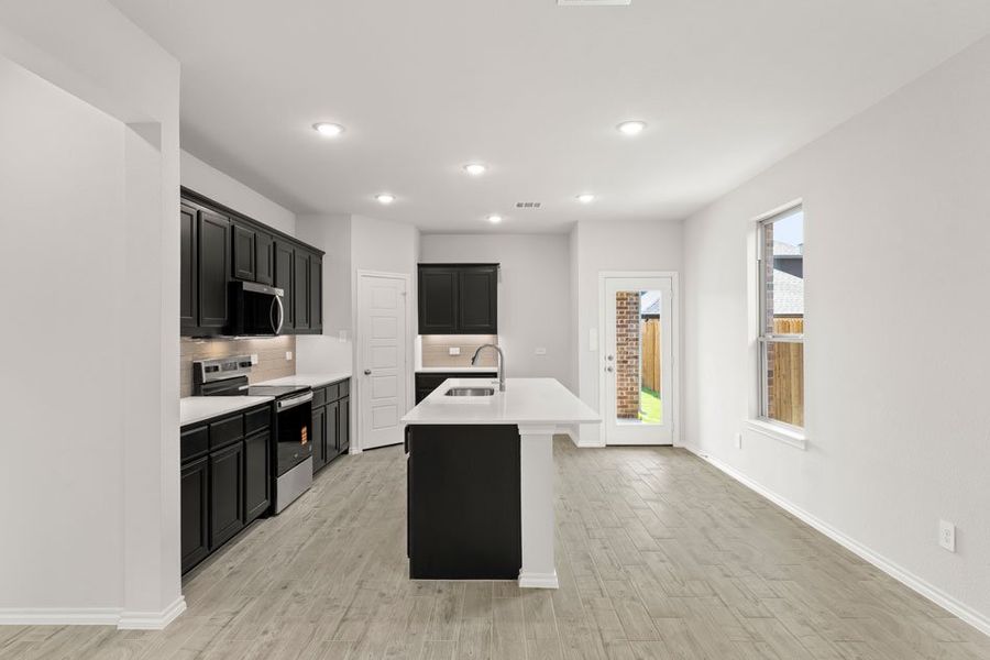 Front exterior of a new home in Keeneland, Aubrey, TX, highlighting curb appeal (Image 10).