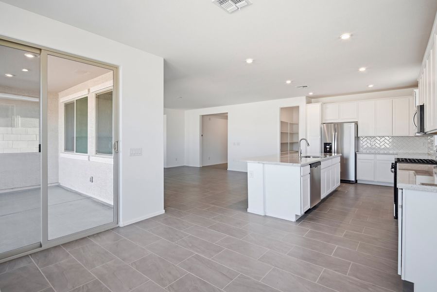 Furnished interior view inside a new home in Marbella at Windrose, Waddell (Image 7).