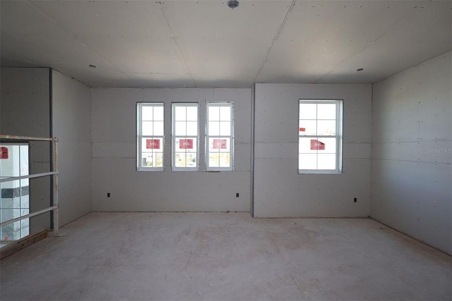 In-progress construction of a new home in Eden at Crossprairie, St. Cloud, FL (Image 17).