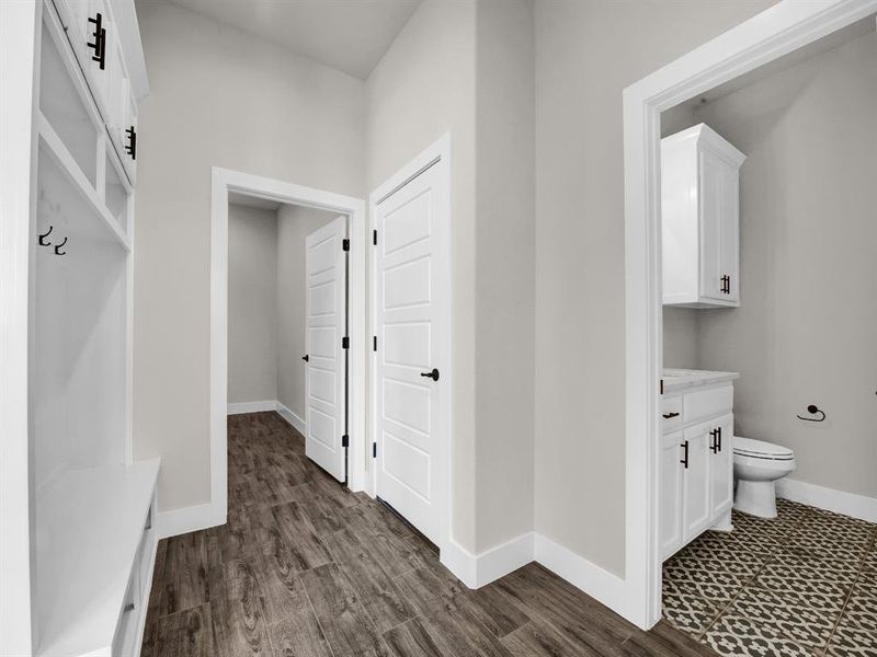 Mudroom featuring dark wood-type flooring