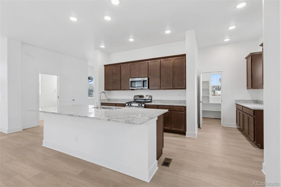 Furnished interior view inside a new home in Painted Prairie Cottage, Aurora (Image 9).