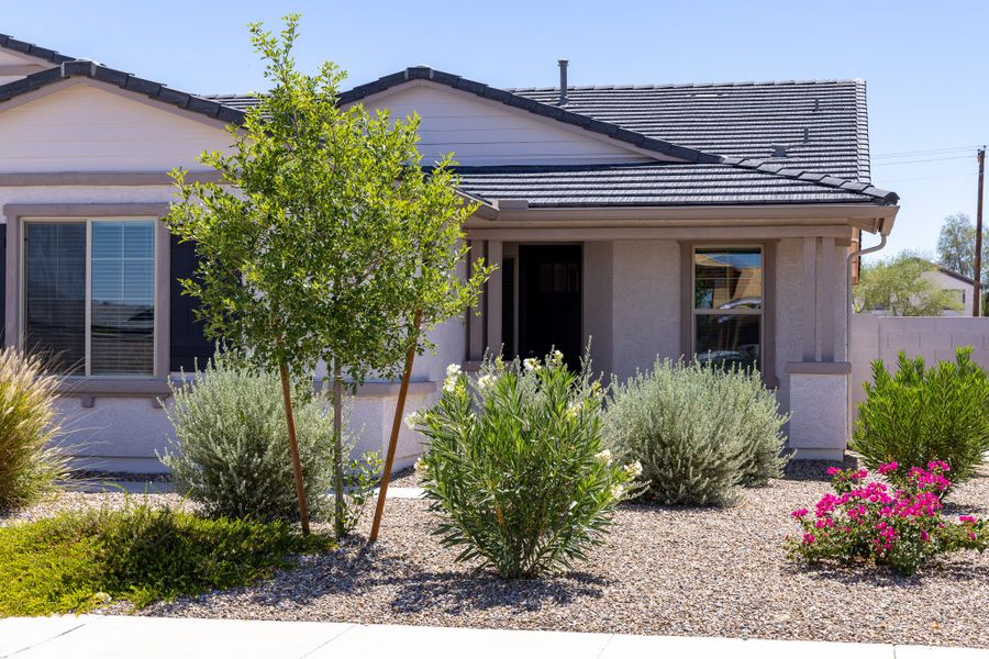 Front exterior of a new home in Rancho Mirage, Maricopa, AZ, highlighting curb appeal (Image 25). Front exterior of a new home in Rancho Mirage, Maricopa, AZ, highlighting curb appeal (Image 25).