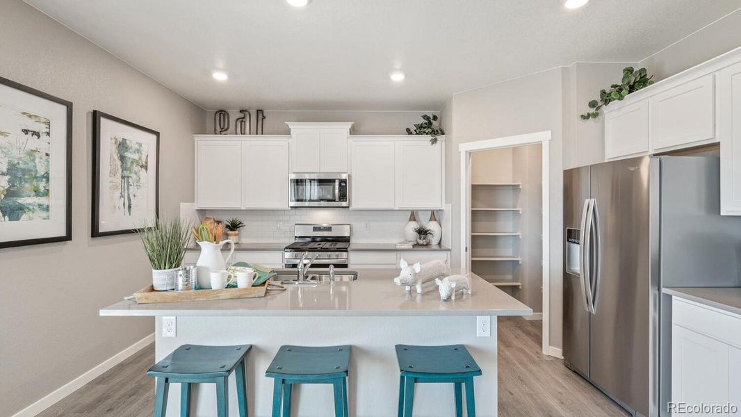 Furnished interior view inside a new home in Trails at Crowfoot, Parker (Image 20).