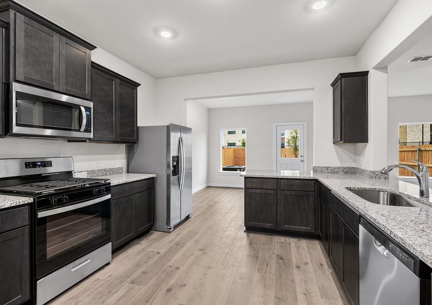 The kitchen has energy-efficient appliances.