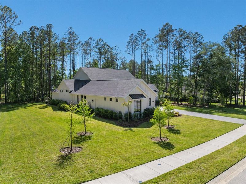 Front exterior of a new home in , Brooksville, FL, highlighting curb appeal (Image 25).