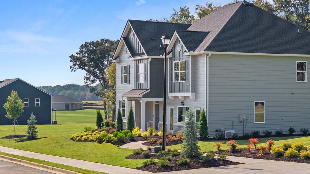 Representative exterior photo of a completed home built from the Halton by D.R. Horton in Jackson Landing, Jefferson, GA (Image 23).