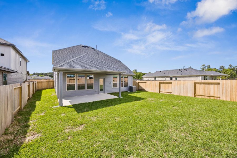 Exterior details and patio area of a home in Montgomery Bend, Montgomery (Image 3).