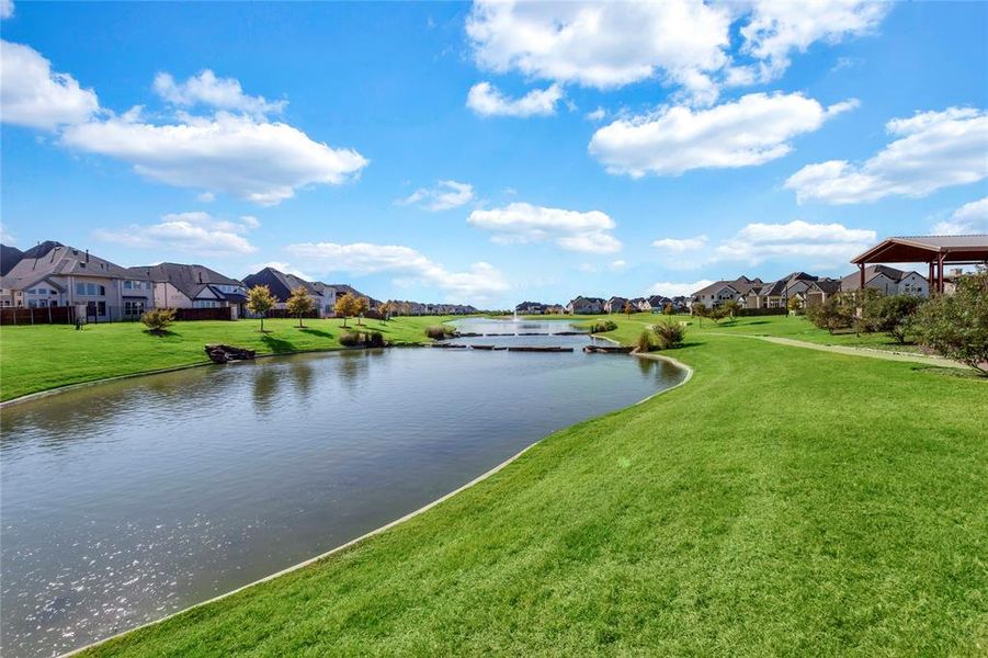 Water view featuring nearby suburban area