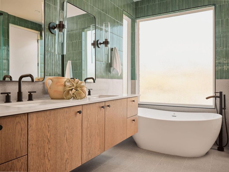 Full bath with a soaking tub, vanity, tile walls, and tiled shower