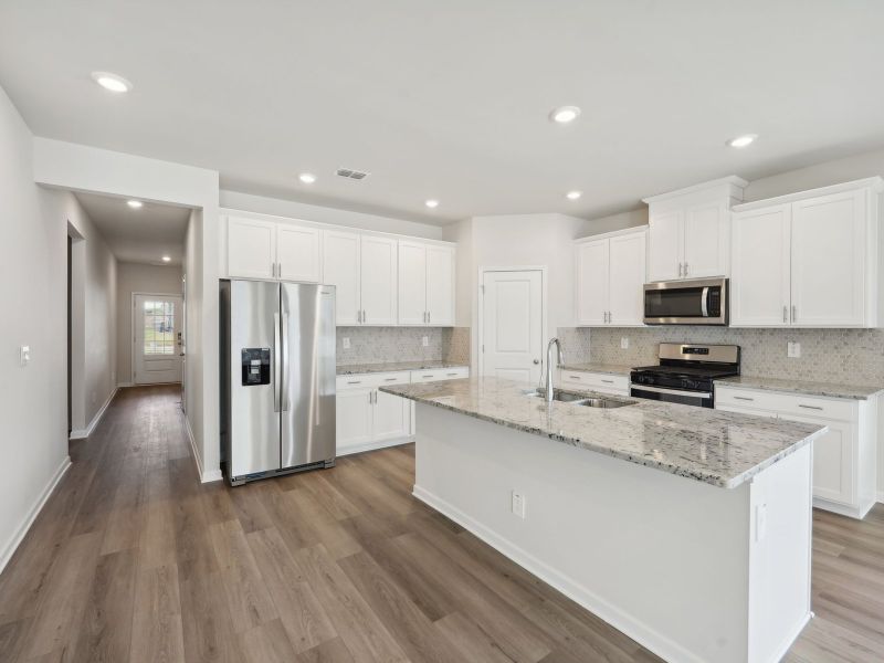 Furnished interior view inside a new home in Martin Springs - Estate Series, Lawrenceville (Image 5).