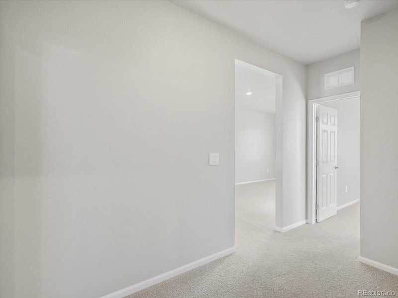 Spacious, unfurnished interior of a new home in Poudre Heights: The Alpine Collection, Windsor (Image 20). Spacious, unfurnished interior of a new home in Poudre Heights: The Alpine Collection, Windsor (Image 20).