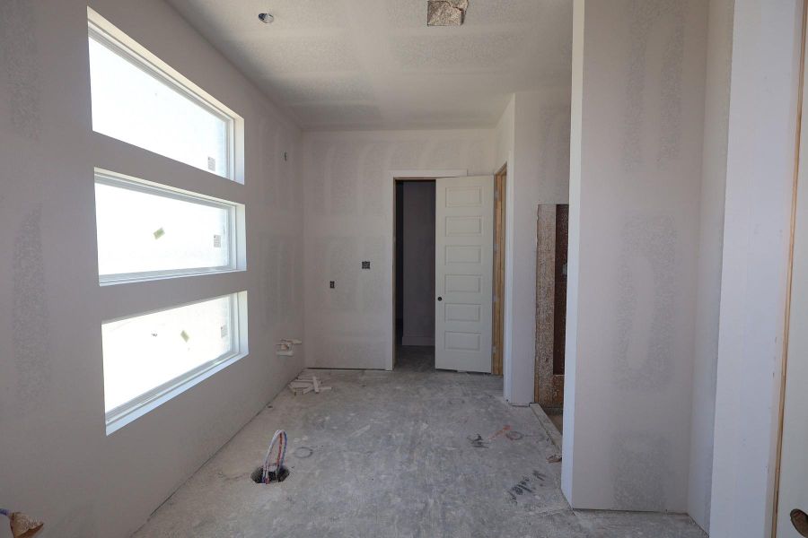 In-progress construction of a new home in Dunham Pointe, Cypress, TX (Image 34).