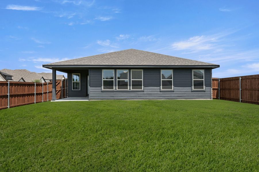 Front exterior of a new home in De Berry Reserve, Royse City, TX, highlighting curb appeal (Image 26). Front exterior of a new home in De Berry Reserve, Royse City, TX, highlighting curb appeal (Image 26).