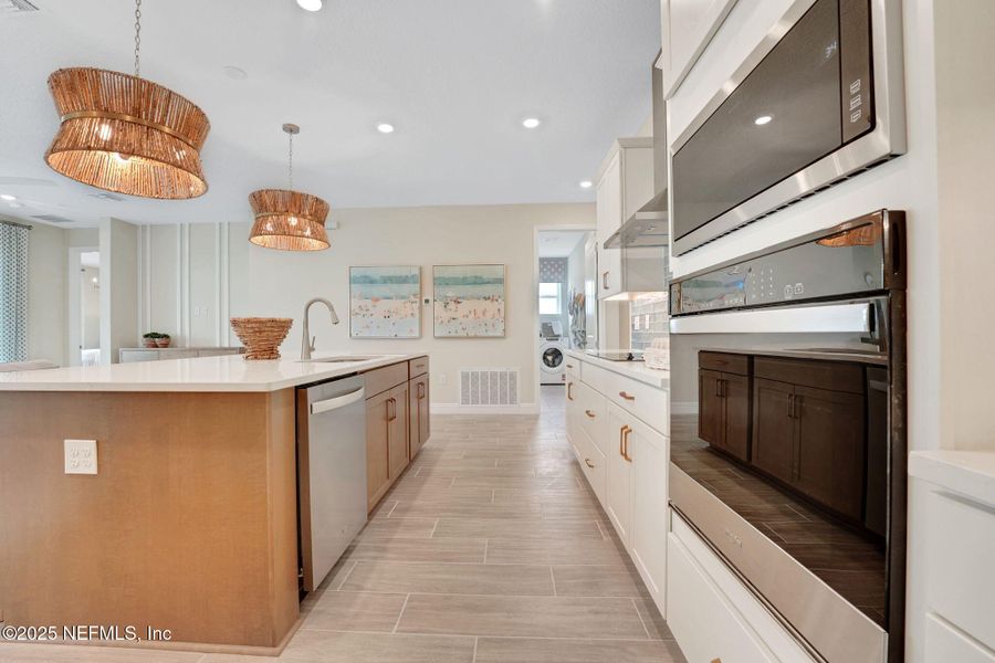 Furnished interior view inside a new home in Amberly, Green Cove Springs (Image 2).