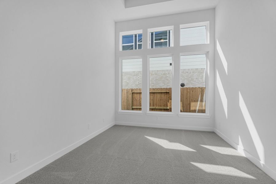 Spacious, unfurnished interior of a new home in Sienna, Missouri City (Image 10).