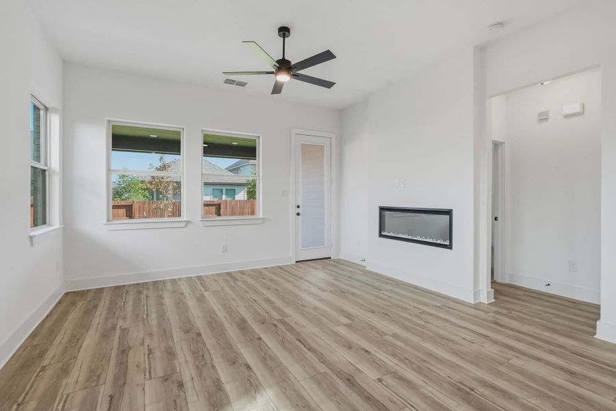 Representative unfurnished interior of a home built from the Sage by Chesmar Homes in Stillwater Ranch, Buda (Image 8).
