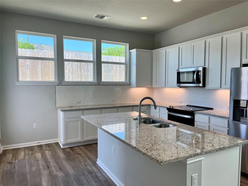 Furnished interior view inside a new home in Fleetwood, Dripping Springs (Image 7). Furnished interior view inside a new home in Fleetwood, Dripping Springs (Image 7).