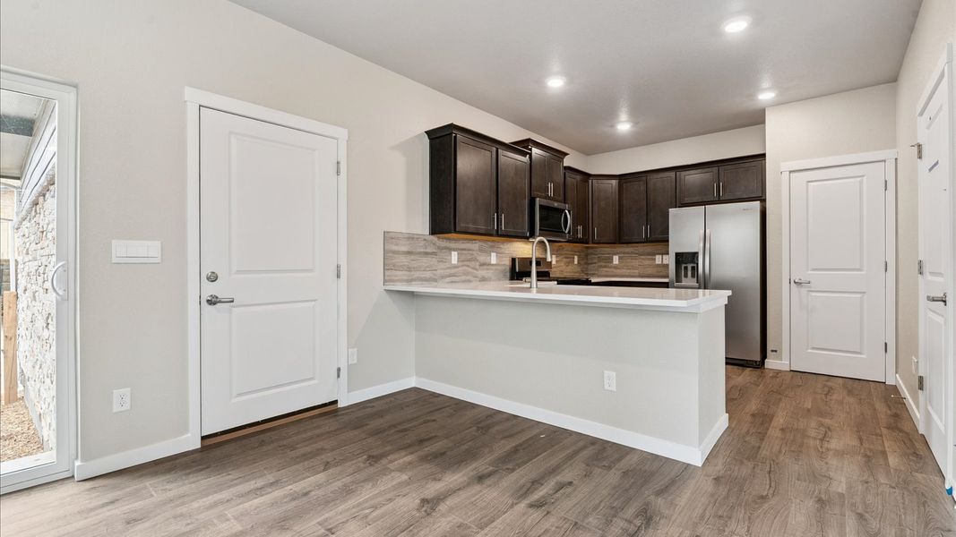 Furnished interior view inside a new home in Sky Ranch, Watkins (Image 11).