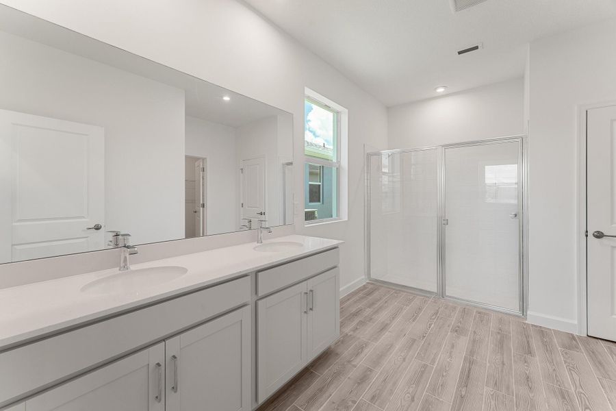 Furnished interior view inside a new home in Tradition - Cadence, Port St. Lucie (Image 8). Furnished interior view inside a new home in Tradition - Cadence, Port St. Lucie (Image 8).