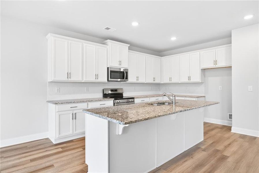 Furnished interior view inside a new home in , Homer (Image 4). Furnished interior view inside a new home in , Homer (Image 4).