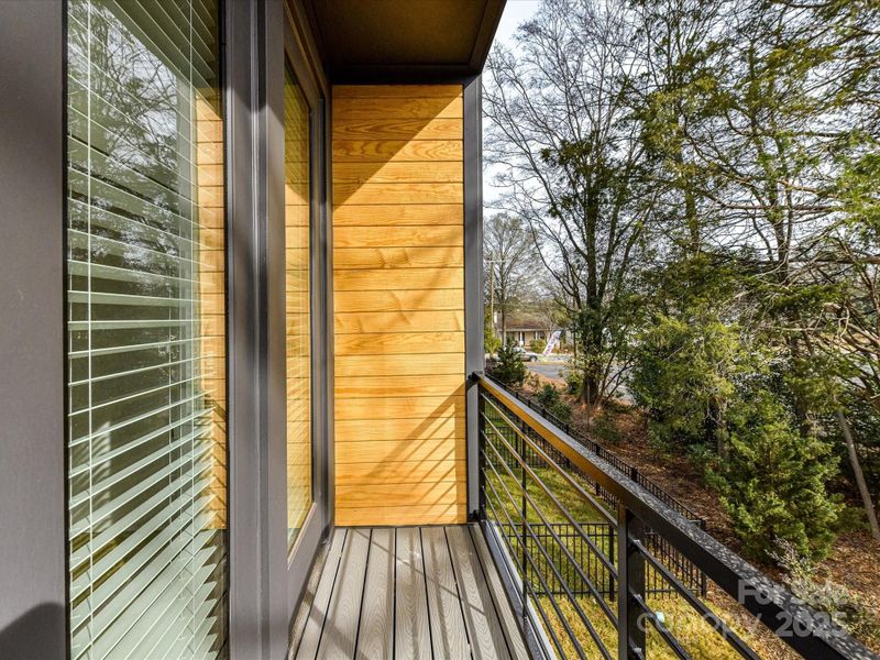 Exterior details and patio area of a home in North End Terraces, Charlotte (Image 15).