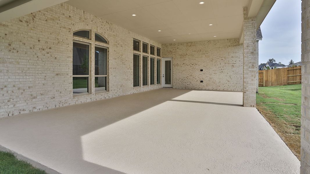 Exterior details and patio area of a home in Evergreen, Conroe (Image 3). Exterior details and patio area of a home in Evergreen, Conroe (Image 3).