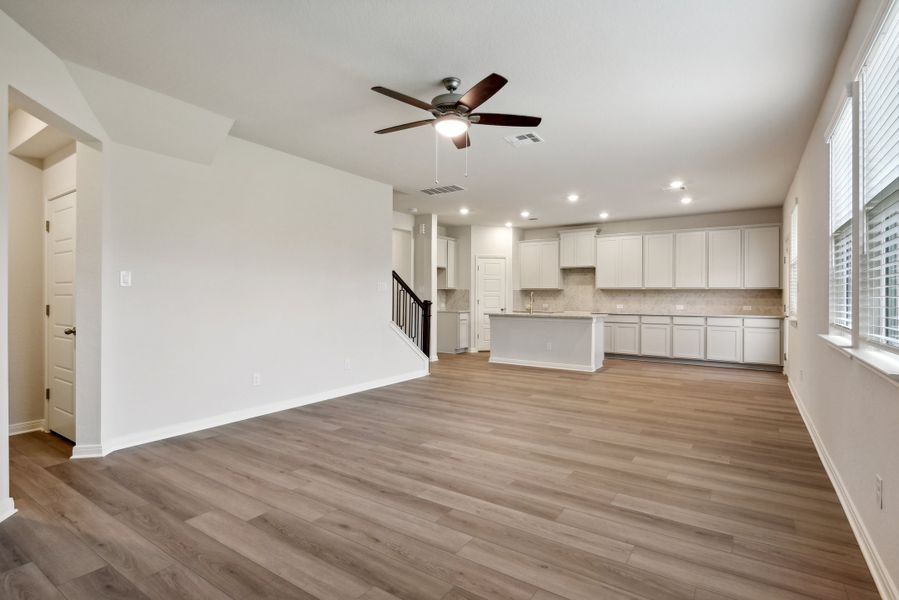 Living room in the Red River floorplan at a Meritage Homes community.