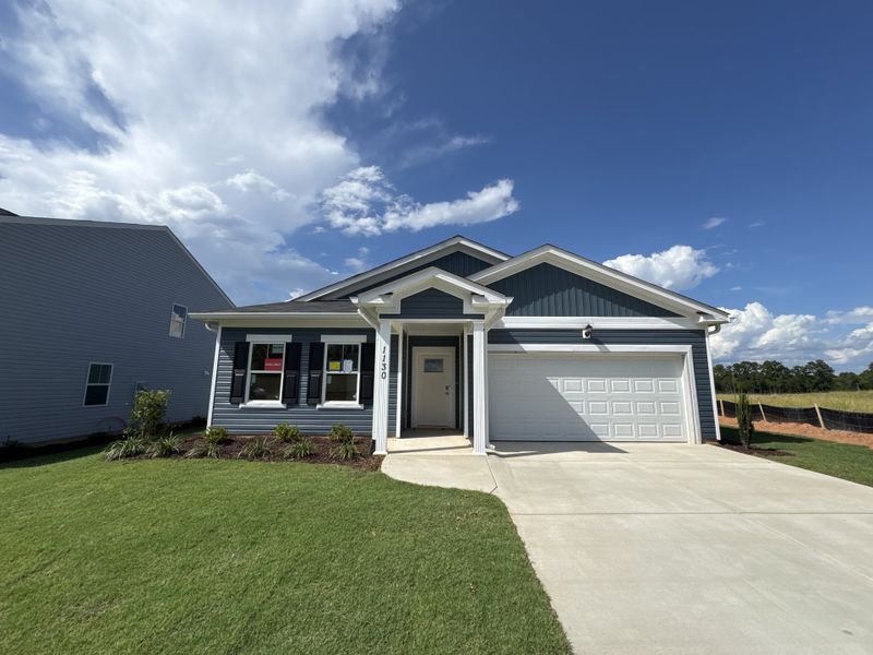 Front exterior of a new home in Declaration Homes at Tillery Park West, Grovetown, GA, highlighting curb appeal (Image 2). Front exterior of a new home in Declaration Homes at Tillery Park West, Grovetown, GA, highlighting curb appeal (Image 2).