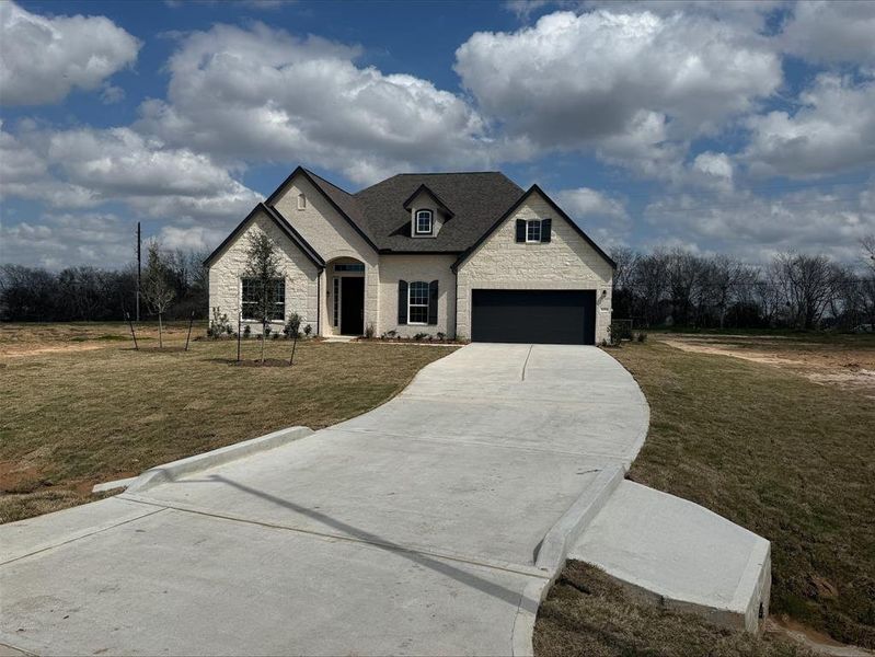 Stunning Margaret design by K. Hovnanian Homes in elevation B built in Tejas Landing.