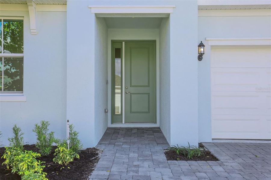 Exterior details and patio area of a home in Brystol North at Wylder, Port St. Lucie (Image 21).