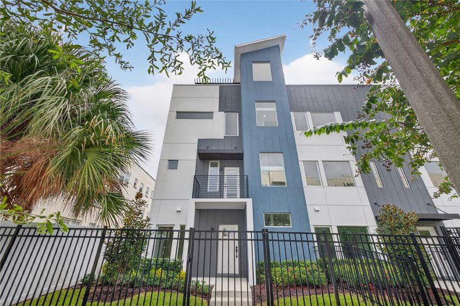 Front exterior of a new home in , St. Petersburg, FL, highlighting curb appeal (Image 27).