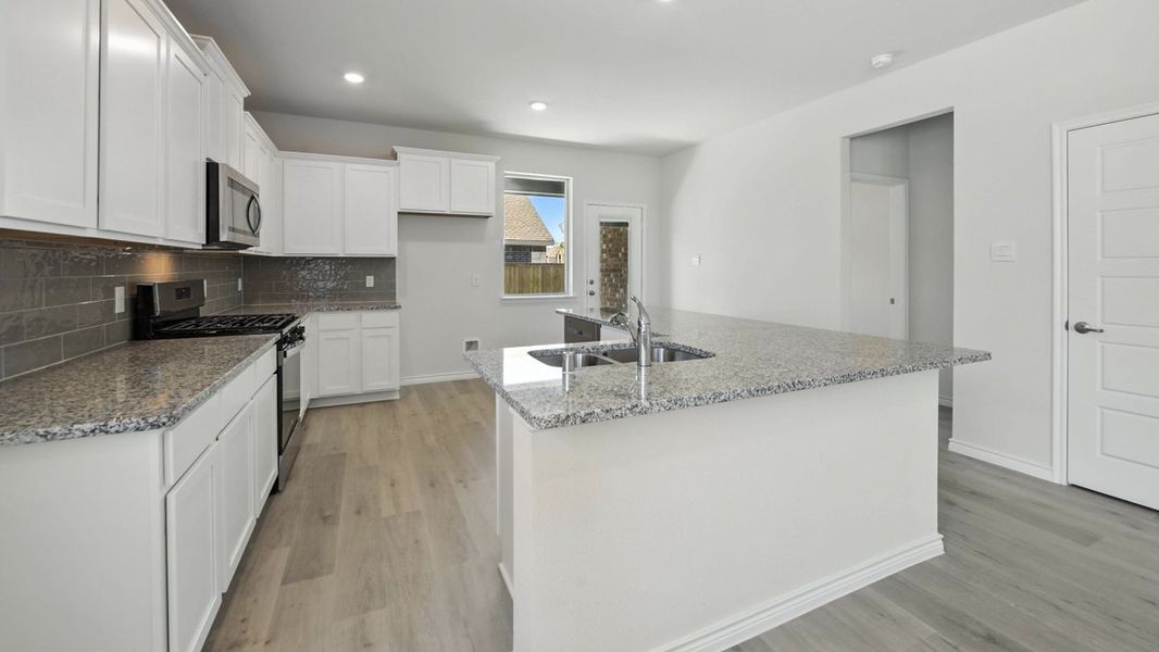 Representative furnished interior of a home built from the Republic by D.R. Horton in The Woods at Lindsey Place, Anna (Image 4). Representative furnished interior of a home built from the Republic by D.R. Horton in The Woods at Lindsey Place, Anna (Image 4).