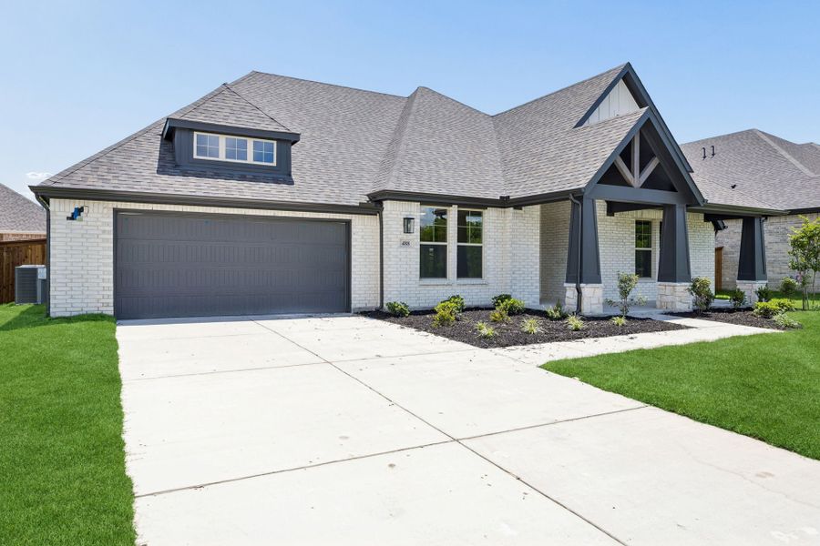 Front exterior of a new home in Dove Hollow, Waxahachie, TX, highlighting curb appeal (Image 20). Front exterior of a new home in Dove Hollow, Waxahachie, TX, highlighting curb appeal (Image 20).