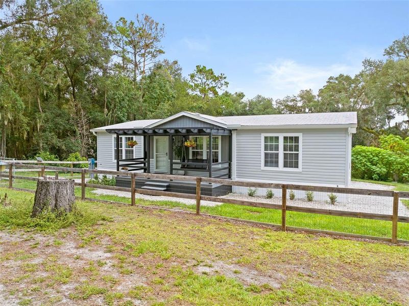 Exterior details and patio area of a home in , Brooksville (Image 37).