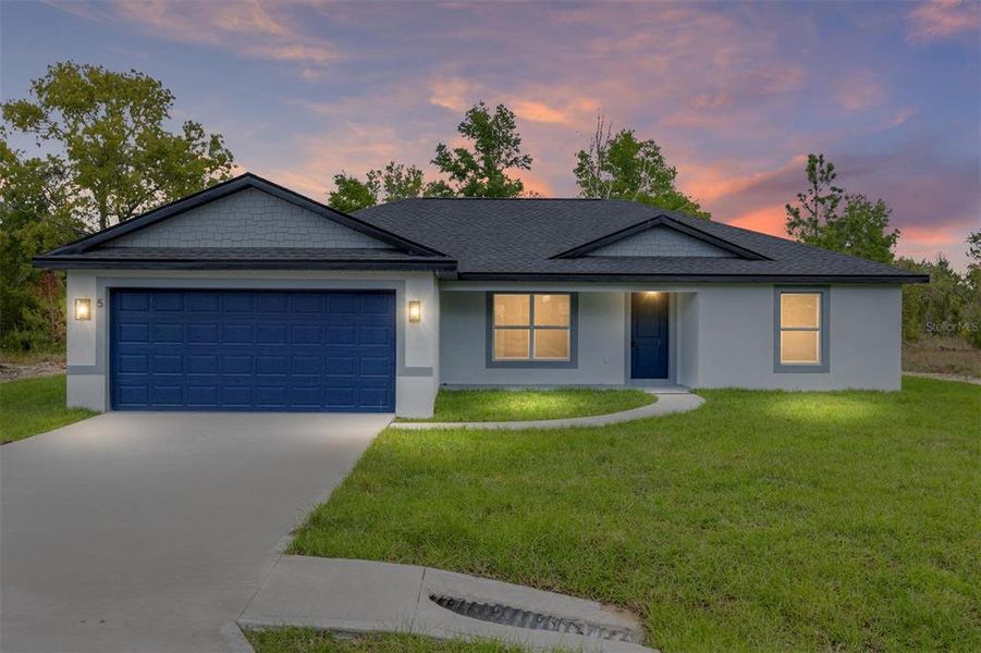 Front exterior of a new home in , Ocklawaha, FL, highlighting curb appeal (Image 20).