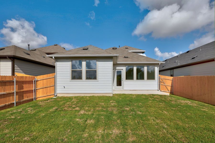 Exterior details and patio area of a home in Trinity Ranch, Elgin (Image 4).