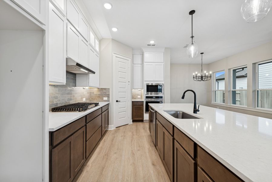 Furnished interior view inside a new home in Elyson 40', Katy (Image 7).