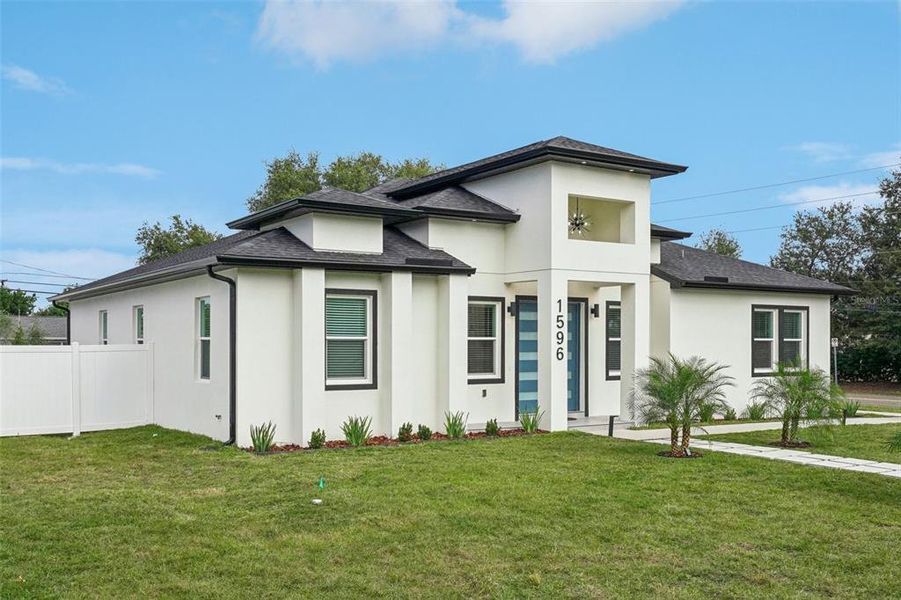 Front exterior of a new home in , Clearwater, FL, highlighting curb appeal (Image 28). Front exterior of a new home in , Clearwater, FL, highlighting curb appeal (Image 28).