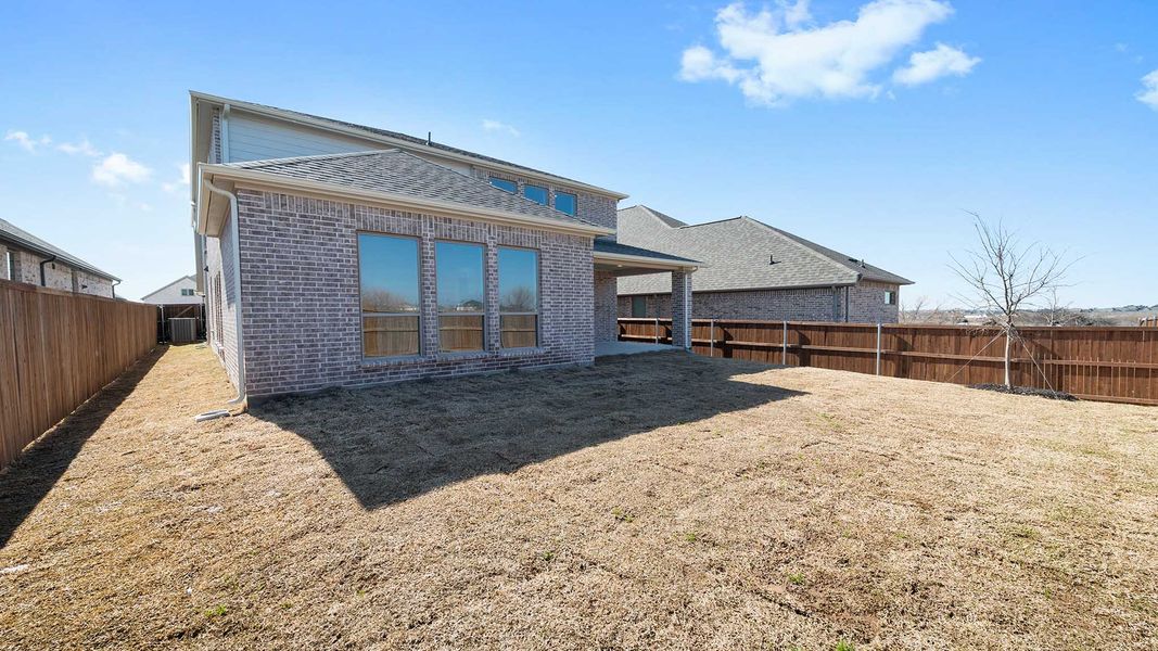 Exterior details and patio area of a home in Devonshire, Forney (Image 4). Exterior details and patio area of a home in Devonshire, Forney (Image 4).