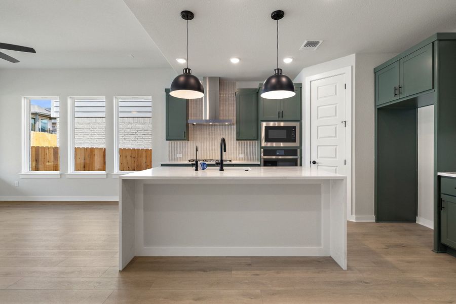 Furnished interior view inside a new home in Heritage, Dripping Springs (Image 13).