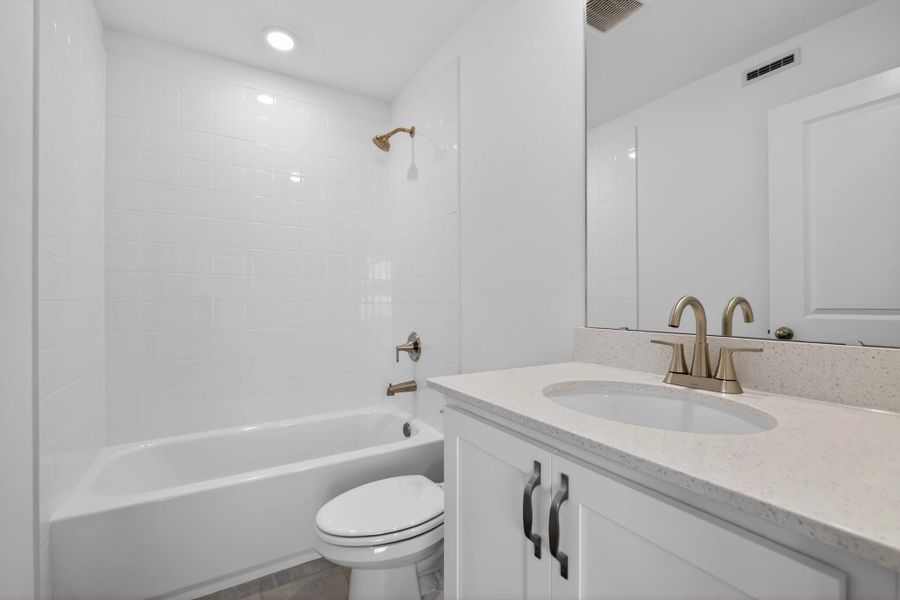Furnished interior view inside a new home in Parkview at Hamlin, Winter Garden (Image 11).