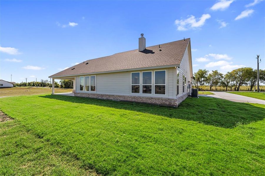 Exterior details and patio area of a home in Fairview Meadows, Rhome (Image 23). Exterior details and patio area of a home in Fairview Meadows, Rhome (Image 23).
