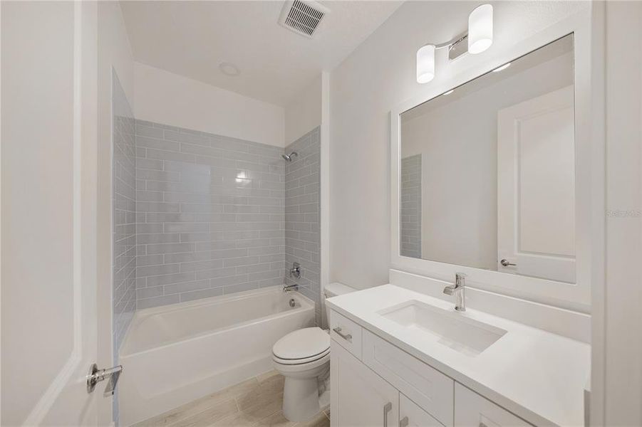 Furnished interior view inside a new home in Shellstone at Waterside, Sarasota (Image 7). Furnished interior view inside a new home in Shellstone at Waterside, Sarasota (Image 7).