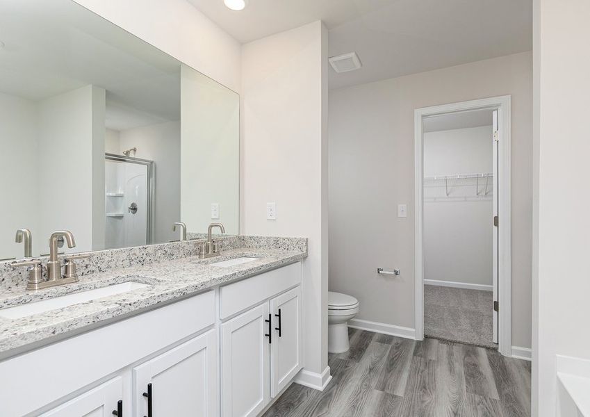 Get ready for your day in the master bathroom