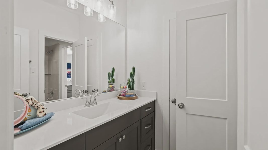 Representative furnished interior of a home built from the Medina by Chesmar Homes in Elyson 50's, Katy (Image 27).