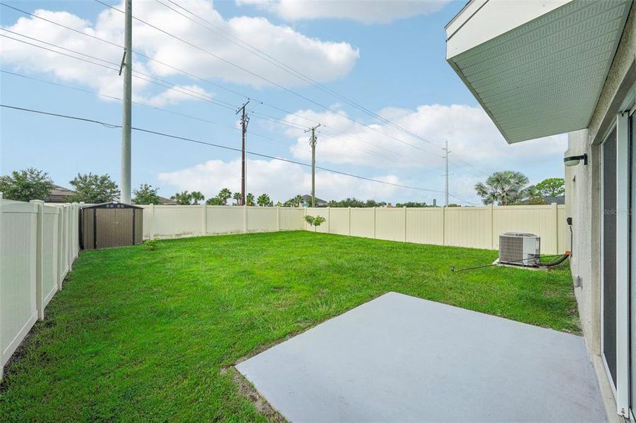 Exterior details and patio area of a home in Ridgewood, Riverview (Image 25).