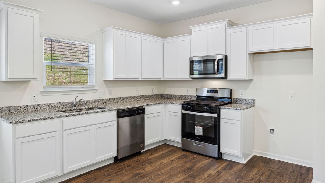 Representative furnished interior of a home built from the Bennet by D.R. Horton in The Hideaway at Fox Meadows, Bluff City (Image 8).